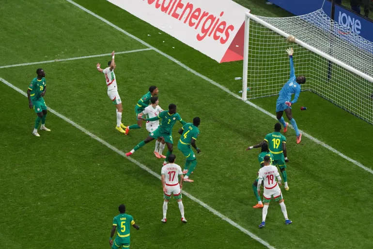 Morocco come so close to equalising but the ball hits the bar [Reuters]
