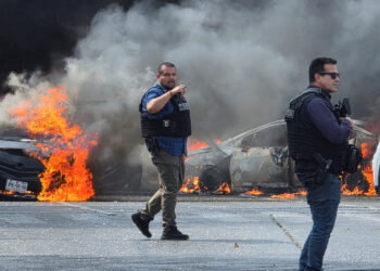 After the Mexican government said it had killed one of the country’s most violent criminal figures, Nemesio Oseguera Cervantes, known as El Mencho, armed groups set fires to buildings and vehicles across Mexico.CreditCredit...Gilberto Gallo/Reuters