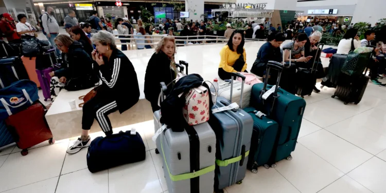 Passengers stranded at Guadalajara International Airport after flights were suspended on Sunday.Credit...Ulises Ruiz/Agence France-Presse — Getty Images