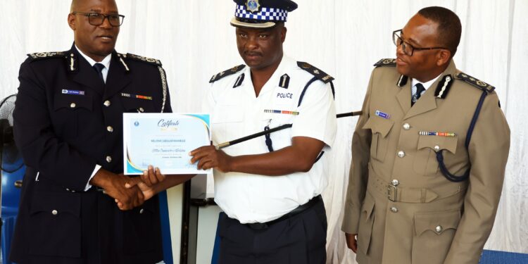 A Station Commander receives their certificate at the conclusion of the 2026 Station Commanders’ Workshop at Matsapha Police Academy. Photo credit: Royal Eswatini Police Service