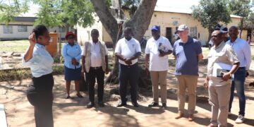 British High Commissioner to Eswatini His Excellency Colin Wells, accompanied by officials from the Ministry of Home Affairs and World Vision Eswatini, is taken on a guided tour of facilities at the Malindza Refugee Reception Centre during an official visit. Photo: World Vision Eswatini.