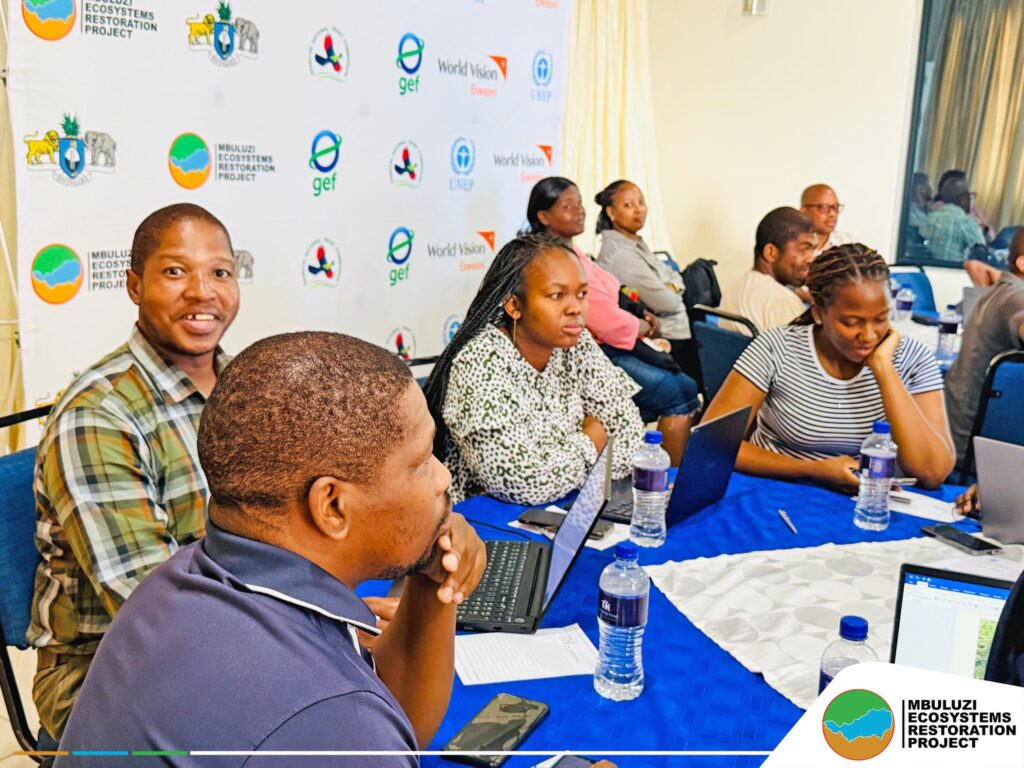 Some of the delegates attending the AFR100 Forum, including government officials, community representatives, and development partners, discuss strategies for restoring Eswatini’s landscapes. Photo by Mbuluzi Ecosystems Restoration Project.