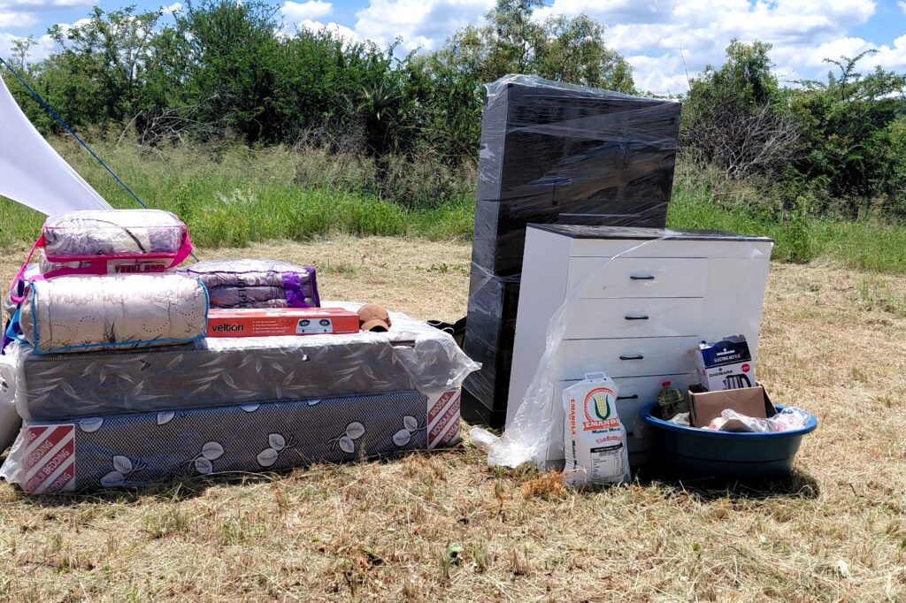 Some of the essential household items provided to the child-headed family at Nkambeni alongside their new home.