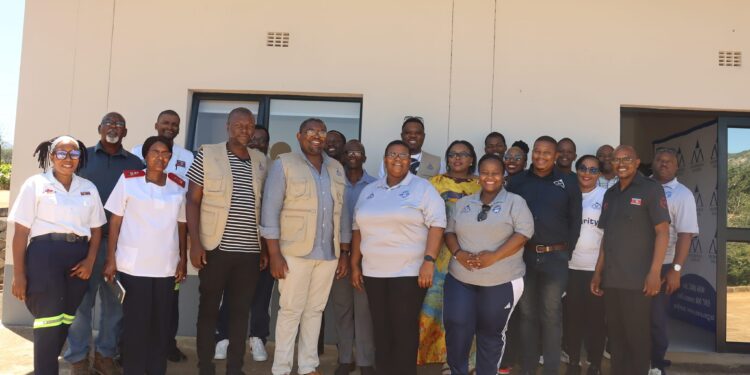 SMVAF Board and project teams pose during a tour of the new Mshinande Stabilisation Centre ahead of its official handover.