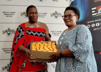 Eswatini TV CEO Mlamuli Dlamini presents sunscreens to Deputy Prime Minister Thulisile Dladla at the DPM’s Office in Mbabane. Photo by DPMO