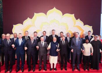 India’s Prime Minister Narendra Modi with world leaders and global technology executives during the India AI Impact Summit in New Delhi.