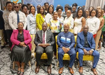 Principal Secretary Ambassador Melusi Masuku with designers, artisans, and stakeholders at the launch of The Business of Fashion IP Programme in Mbabane.
