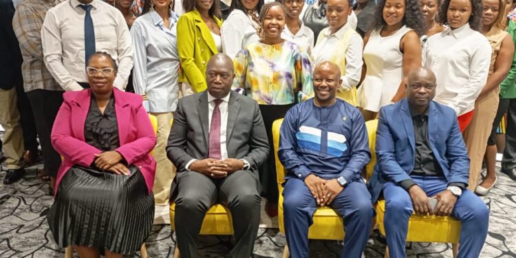 Principal Secretary Ambassador Melusi Masuku with designers, artisans, and stakeholders at the launch of The Business of Fashion IP Programme in Mbabane.