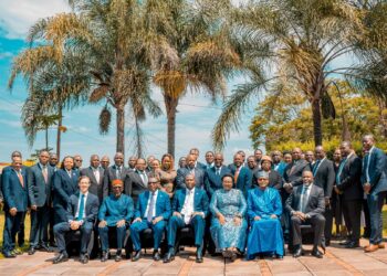 Government officials and senior leaders pose for a group photo following the Cabinet Retreat w