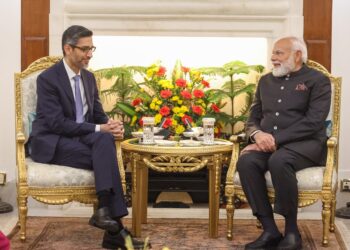 Prime Minister Narendra Modi meets Sundar Pichai on the sidelines of the AI Impact Summit in New Delhi. Photo: X/@narendramodi