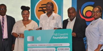 ESCCOM partners and officials pose with the E300 000 cheque supporting the national high school film competition. Photo by InsideBiz