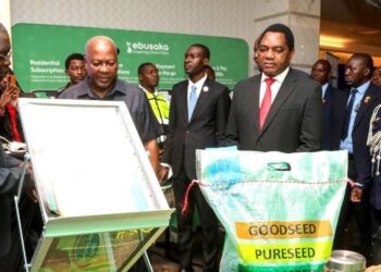 Zambian President Hakainde Hichilema and Ghanaian President John Dramani Mahama examine local farm produce during the Ghana–Zambia business dialogue in Lusaka.