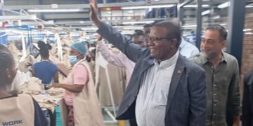 Minister of Commerce, Industry and Trade Honourable Manqoba Khumalo (MP) greets workers during a tour of the newly renovated Sigma Blue factory in Matsapha. Photo: Ministry of Commerce, Industry and Trade.