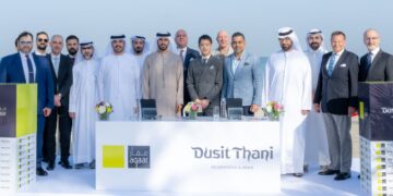 Executives from Aqaar and Dusit International pose together to mark the launch of the Dusit Thani Residences Ajman