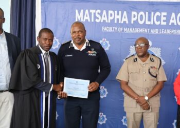 National Commissioner of Police, Mr Manoma Vusie Masango, presents a Diploma in Police Science certificate to one of the 27 graduating officers at the Matsapha Police Academy on February 17, 2026.