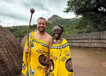 Chris and Adenike Joondeph, the couple behind Authentic Traveling, pose in traditional Emahiya attire during their cultural tour in Eswatini. Photo: Authentic Traveling Facebook Page