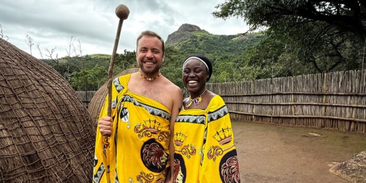 Chris and Adenike Joondeph, the couple behind Authentic Traveling, pose in traditional Emahiya attire during their cultural tour in Eswatini. Photo: Authentic Traveling Facebook Page