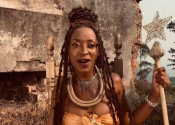 "Stella Jacobs performing in the Bayethe music video featuring Makwakwa Thabo