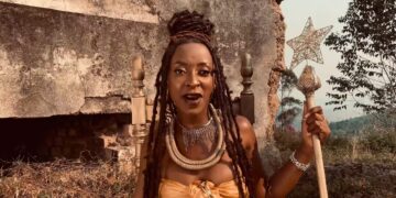 "Stella Jacobs performing in the Bayethe music video featuring Makwakwa Thabo