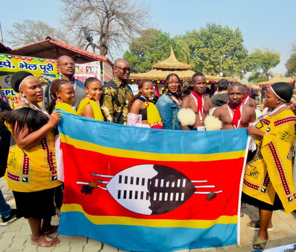 Eswatini Cultural Troupe and gospel artist Siphiwo Ndoni receive a morale boost from H.E. Menzi Dlamini during his visit to the 39th Surajkund International Crafts Mela in India.