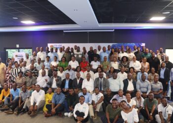 EWADE Chief Executive Officer Dr Samson Sithole joins management, staff and the Founding CEO for a group photo during the launch of the Digital Transformation Strategy at the Operatus Mundi gathering in Mbabane on February 26, 2026.