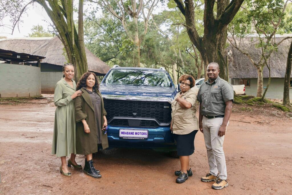 The Minister of Tourism and Environmental Affairs Hon. Jane Mkhonta-Simelane and Eswatini Tourism Authority CEO Vusie Norman Dlamini pose alongside the Foton Tunland at the Adventure Awaits launch.