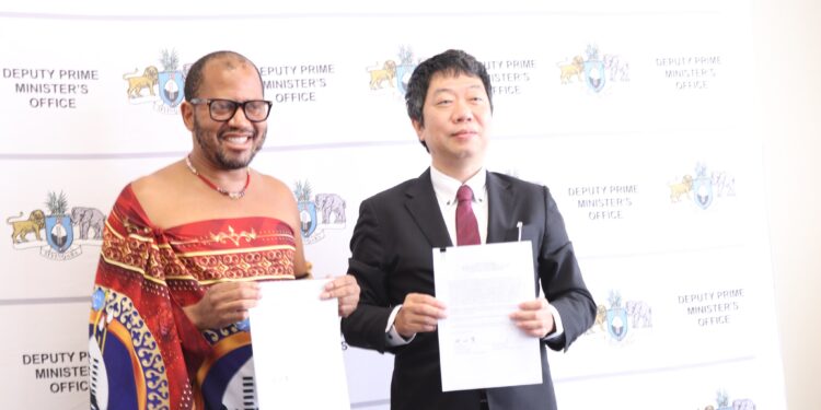 Principal Secretary Sibusiso Nkambule and JICA Chief Representative Kunihiko Okada hold the signed MoU marking the launch of Japan’s Third Grant Aid Project for education in Eswatini. Photo by DPMO