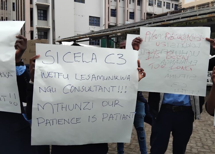 Laboratory staff protest over delayed pay, years of contract employment