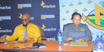 Enactus Eswatini Country Director Sabelo Dlamini and Malkerns Town Council Acting Town Clerk Nokwanda Kgomo sign the Memorandum of Understanding that paves the way for a year-long entrepreneurship development programme targeting unemployed youth in Malkerns.