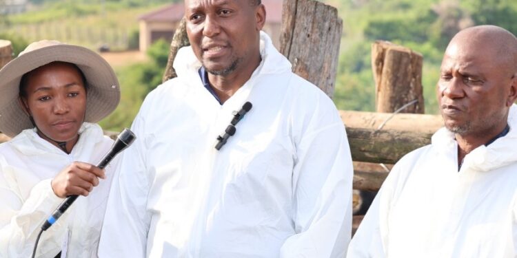 Prime Minister Russell Mmiso Dlamini addresses the gathering at Mzimnene dip tank in the Manzini Region on Wednesday, calling on emaSwati to cooperate with Government in the fight against Foot and Mouth Disease.