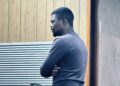 Con artist blames family hardships for electronic scams