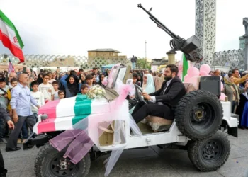 Iran stages mass weddings for couples ready for war ‘sacrifice’