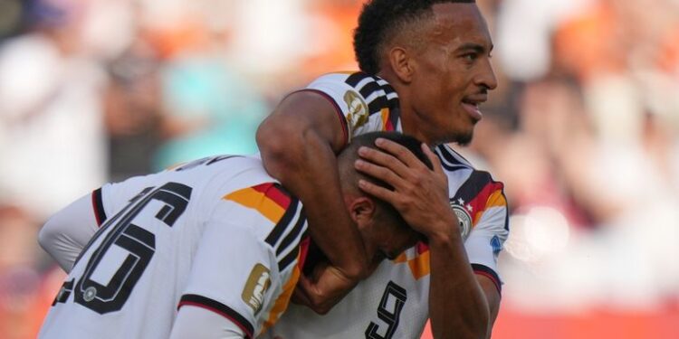 Undav injury-time goal sees Germany beat Ivory Coast to top World Cup group