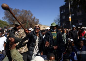 Anti-immigrant protesters take part in a demonstration on the day of an unofficial deadline set by anti-immigrant groups for all undocumented migrants to leave, in Johannesburg, South Africa, June 30, 2026. REUTERS/Oupa Nkosi