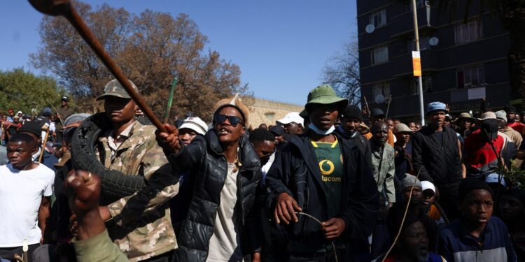 Anti-immigrant protesters take part in a demonstration on the day of an unofficial deadline set by anti-immigrant groups for all undocumented migrants to leave, in Johannesburg, South Africa, June 30, 2026. REUTERS/Oupa Nkosi