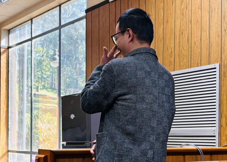 Chinese national pleads guilty in nine-count fraud cases